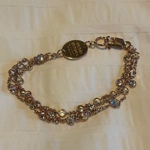 Henri Bendel 3 strand rose gold and rhinestone bracelet